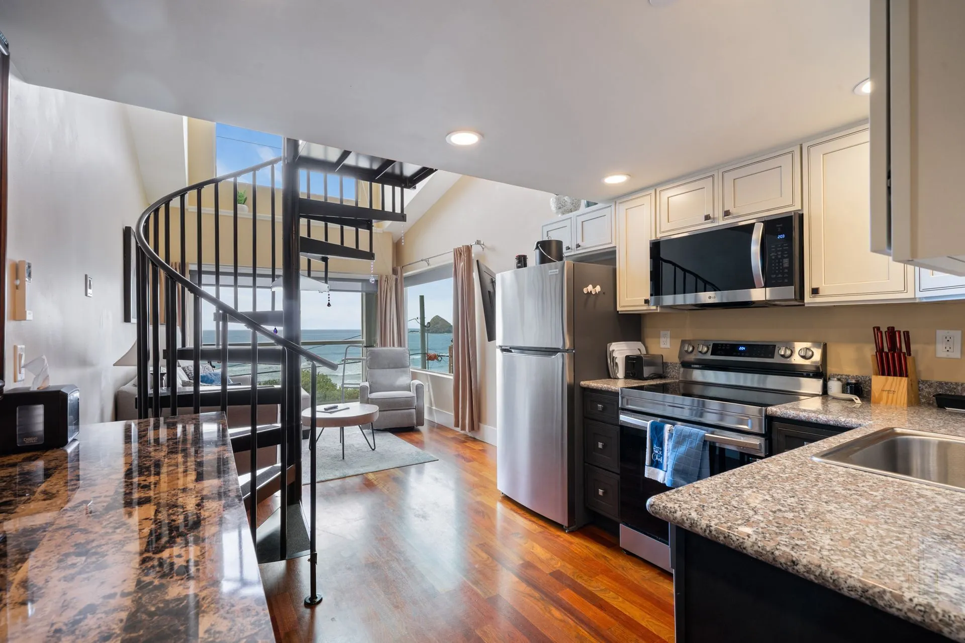 Room 1 kitchen with spiral staircase