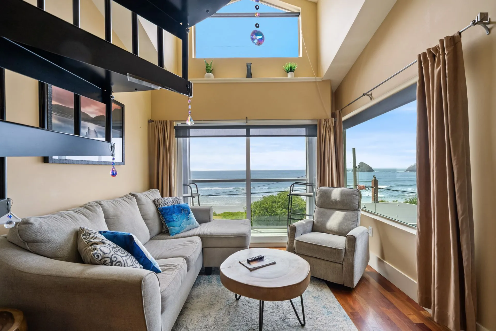Suite living room with ocean views at Three Arch Inn
